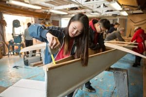 students making canoe