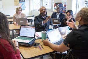 Educators engaged in discussion