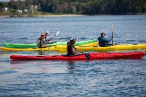 Students on a kayaking expedition. Equity means access.