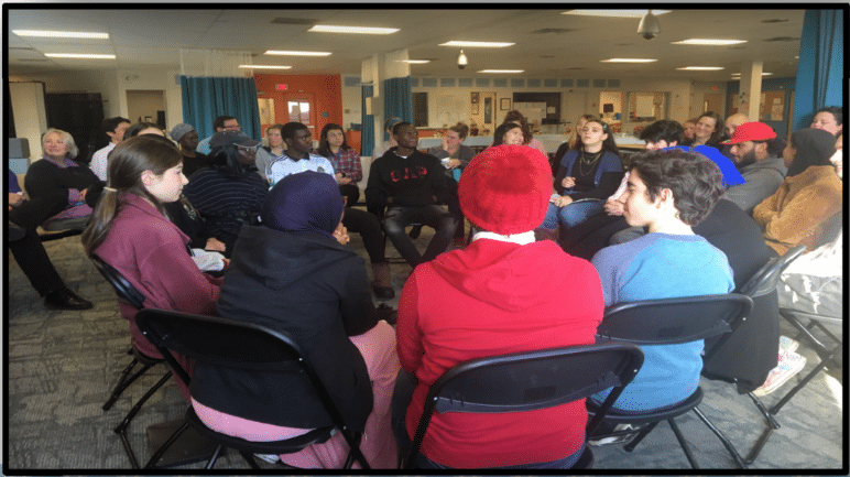 Students and Staff at Fish Bowl Professional Development Activity