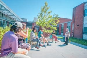 Students gathered in the community courtyard
