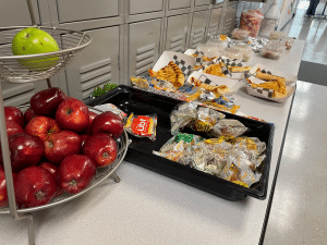 The food table with snacks and lunch.