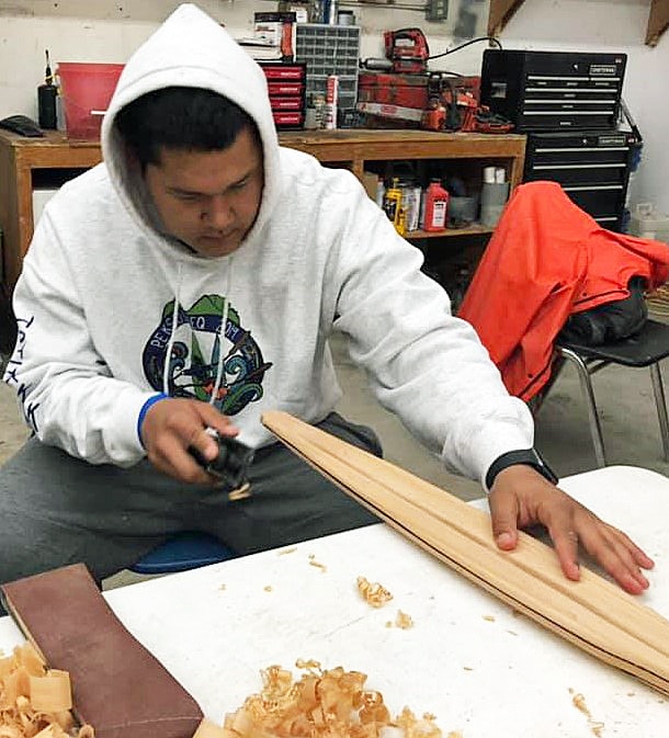 Student Making a Kayak Paddle