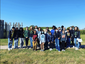 group of students standing outside together