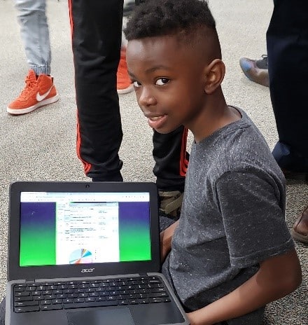 Pioneer Ridge Student With Laptop