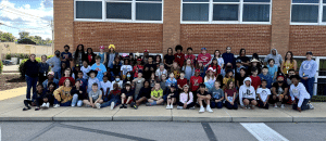 Group of kids in front of school building