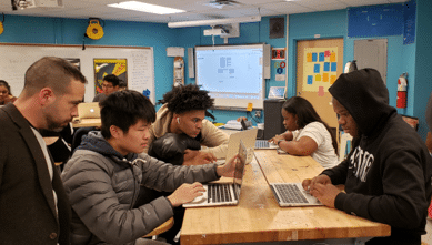 Students Working on Laptops at UAMA