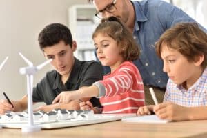 Elementary school pupils learning about renewable energy