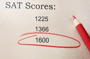 Red circle and pencil with SAT scores and 1600