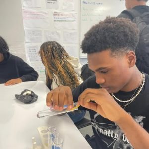 Student working on science experiment