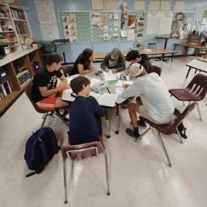 High School students working together at tables