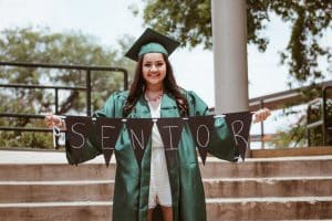 Student in Graduation Gown