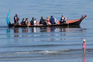 Group paddling in an Indigenous canoe